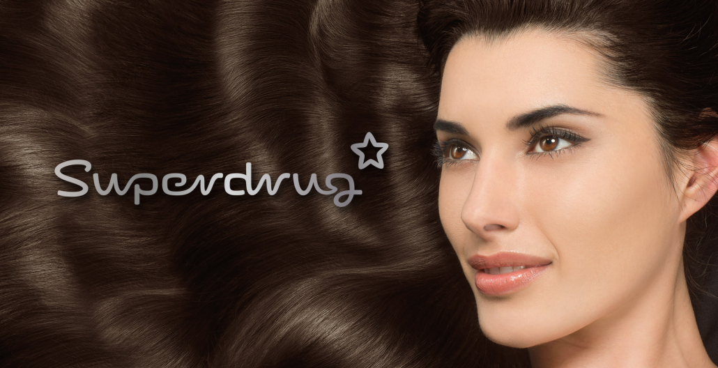 Superdrug logo on top of model with long flowing hair