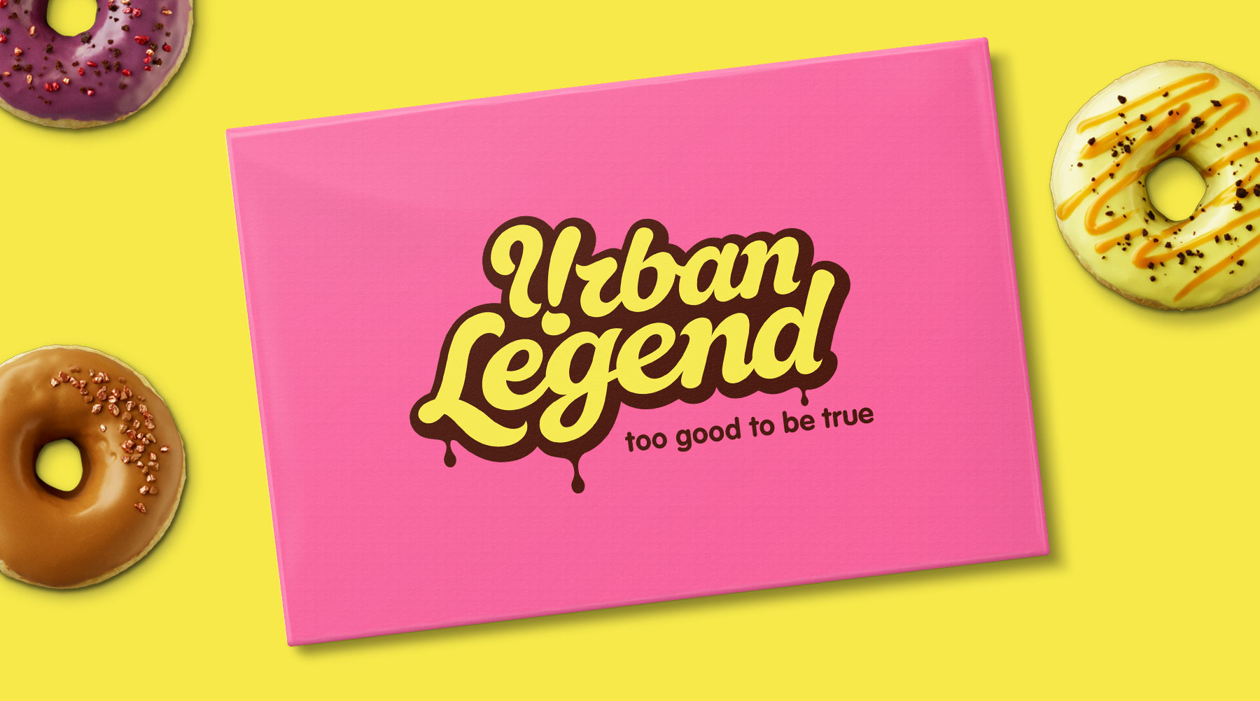 Top of a pink Urban Legend donut box on a yellow background with 3 Urban Legend Donuts design by Biles Hendry